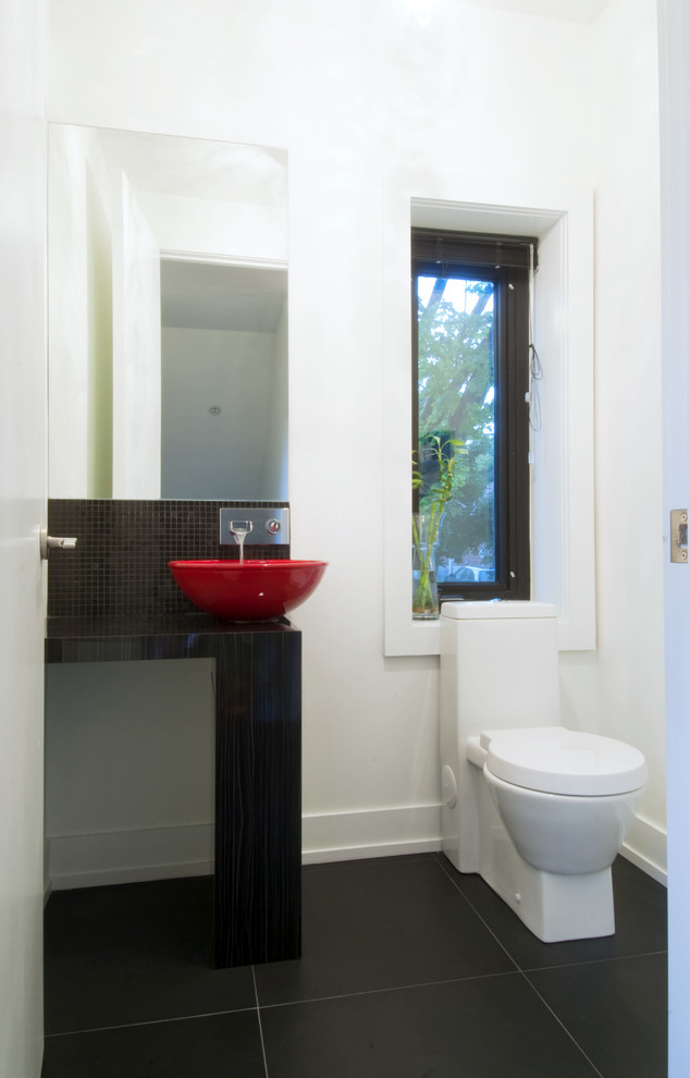 Example of a minimalist mosaic tile bathroom design in Toronto with a vessel sink