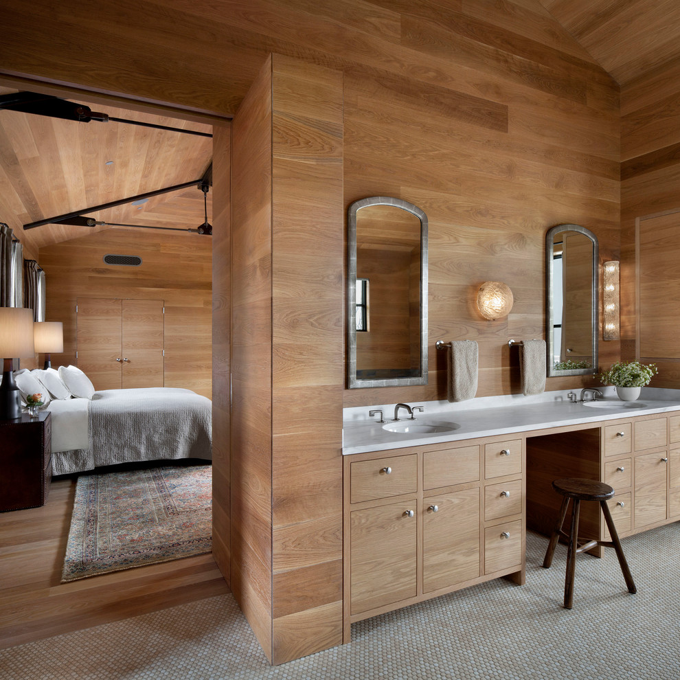 Exemple d'une salle de bain tendance en bois clair avec un placard à porte plane, un sol en carrelage de terre cuite et un lavabo encastré.