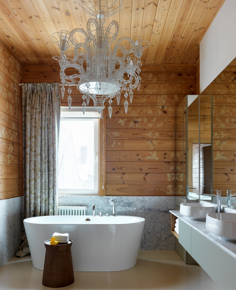 Design ideas for a rustic bathroom in Other with flat-panel cabinets, grey cabinets, a freestanding bath, brown walls, a vessel sink, beige floors, grey worktops, double sinks, a floating vanity unit, a wood ceiling and wood walls.