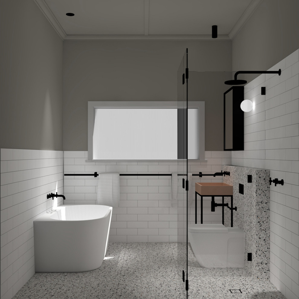 Стильный дизайн: детская ванная комната в современном стиле с черными фасадами, отдельно стоящей ванной, угловым душем, унитазом-моноблоком, белой плиткой, керамической плиткой, белыми стенами, полом из терраццо, раковиной с несколькими смесителями, столешницей из бетона, бежевым полом, душем с распашными дверями, оранжевой столешницей, тумбой под одну раковину и напольной тумбой - последний тренд