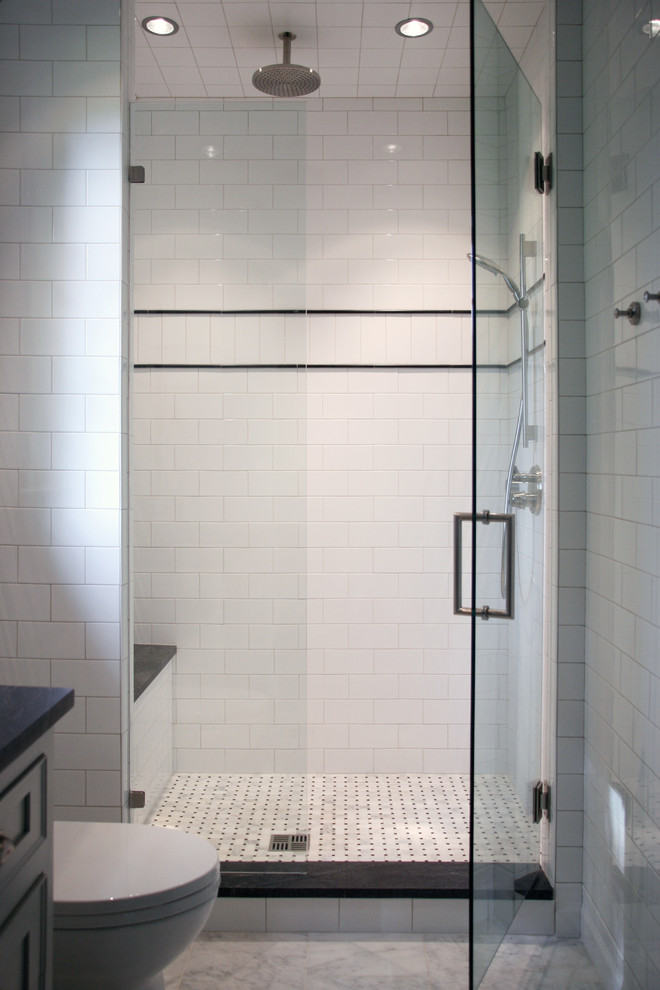 Medium sized contemporary shower room bathroom in Atlanta with a submerged sink, recessed-panel cabinets, grey cabinets, granite worktops, an alcove shower, a one-piece toilet, white tiles, metro tiles, white walls and marble flooring.