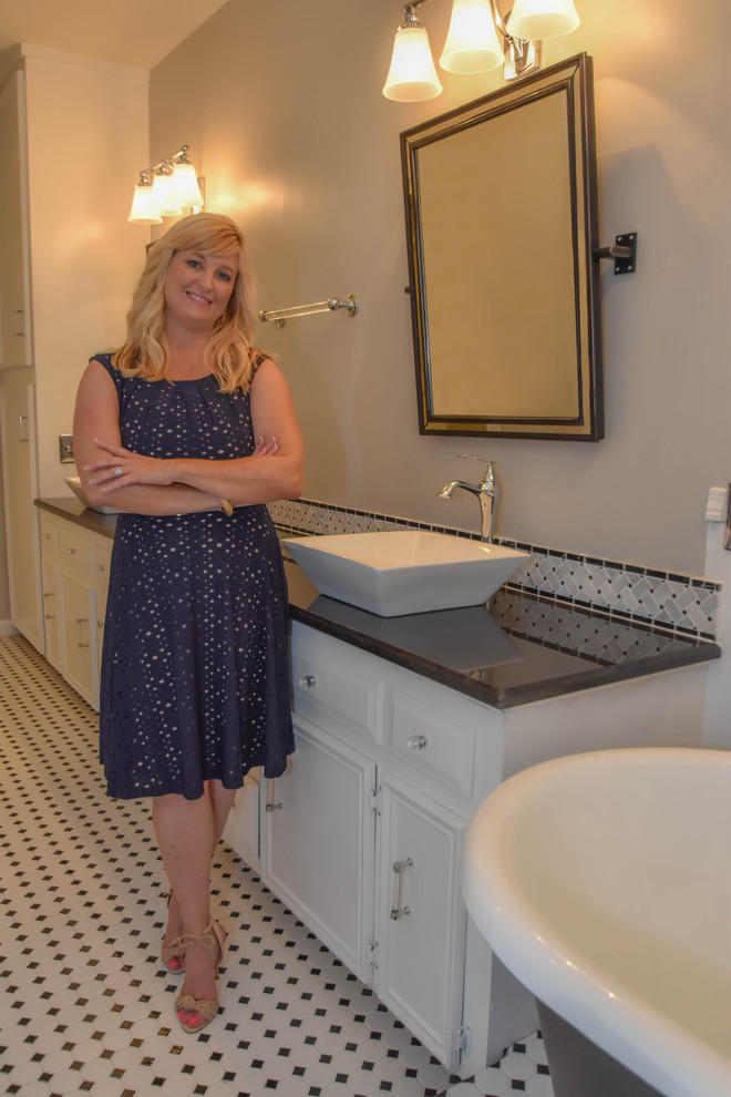 Classic bathroom in Houston with white cabinets, a claw-foot bath, a walk-in shower, a one-piece toilet, black and white tiles, mosaic tiles, grey walls, mosaic tile flooring, a vessel sink, granite worktops and flat-panel cabinets.