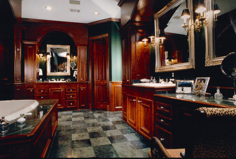 Example of a large classic master green tile and stone tile marble floor bathroom design in Houston with a drop-in sink, raised-panel cabinets, medium tone wood cabinets, marble countertops, a two-piece toilet and green walls