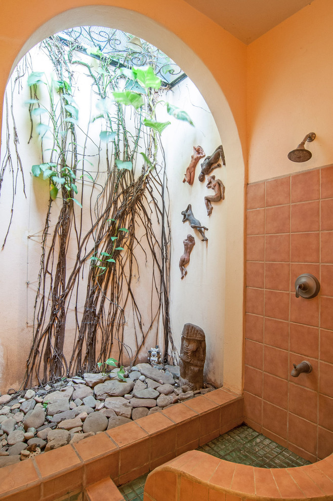 Example of an island style bathroom design in Other