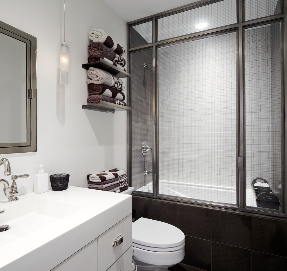Inspiration for a contemporary white tile and subway tile tub/shower combo remodel in New York with flat-panel cabinets, white cabinets and an undermount tub