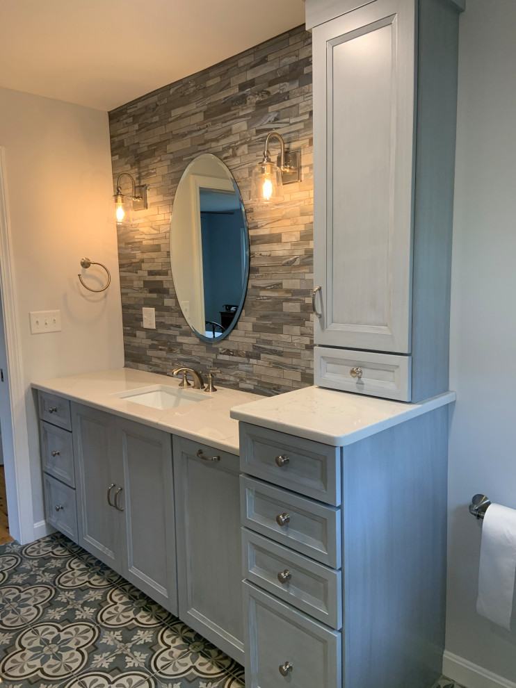 Bathroom - mid-sized traditional master gray tile and porcelain tile porcelain tile, gray floor and single-sink bathroom idea in Boston with shaker cabinets, gray cabinets, a one-piece toilet, gray walls, an undermount sink, quartz countertops, white countertops, a niche and a built-in vanity