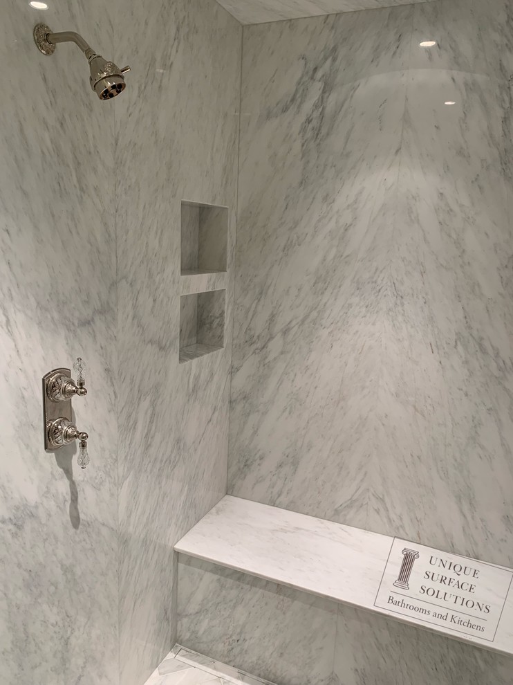 Inspiration for a mid-sized contemporary master white tile and stone slab marble floor and white floor alcove shower remodel in Atlanta with white walls and a hinged shower door