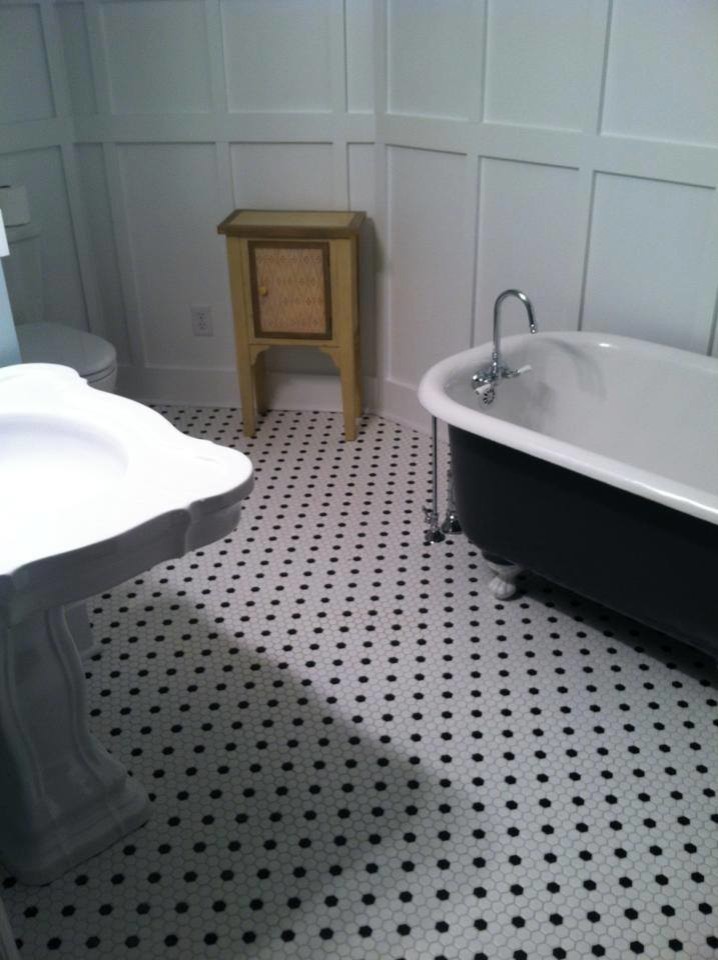 Hudsonville, 100 year old home. Created two new bathrooms out of one