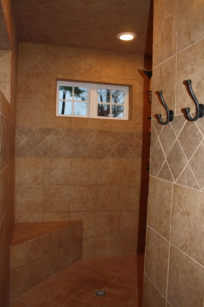 Corner shower - traditional master corner shower idea in New Orleans