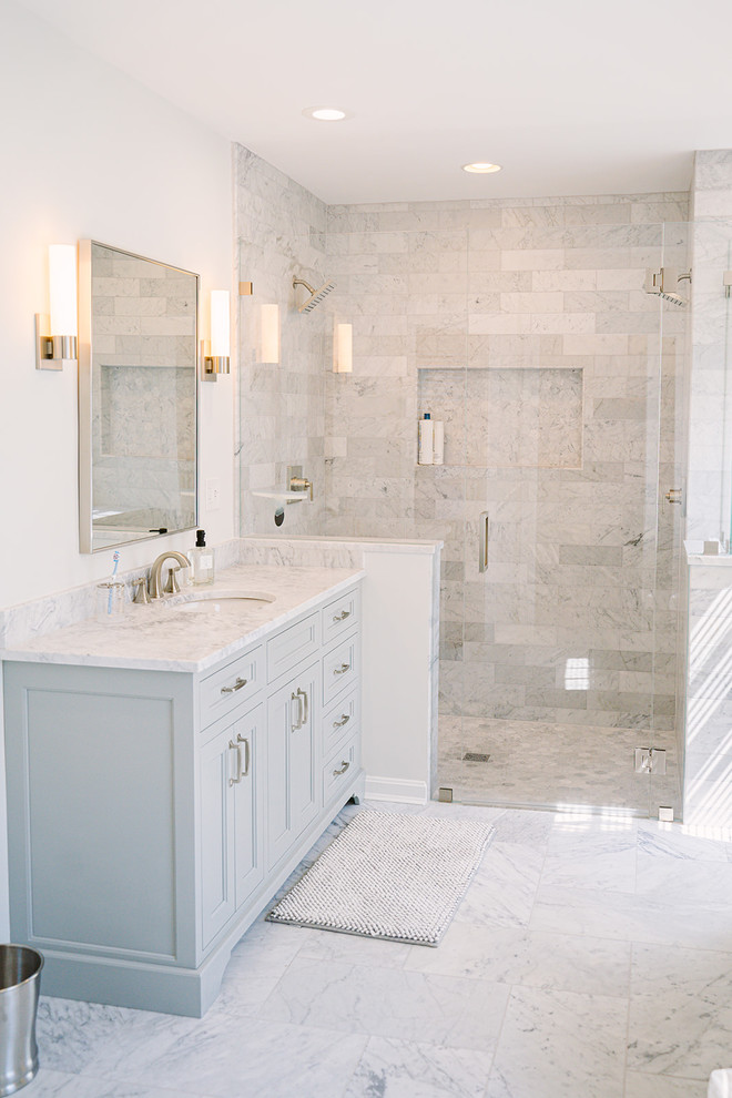 Large transitional master gray tile and marble tile marble floor and gray floor walk-in shower photo in Cincinnati with recessed-panel cabinets, gray cabinets, white walls, an undermount sink, marble countertops, a hinged shower door and gray countertops