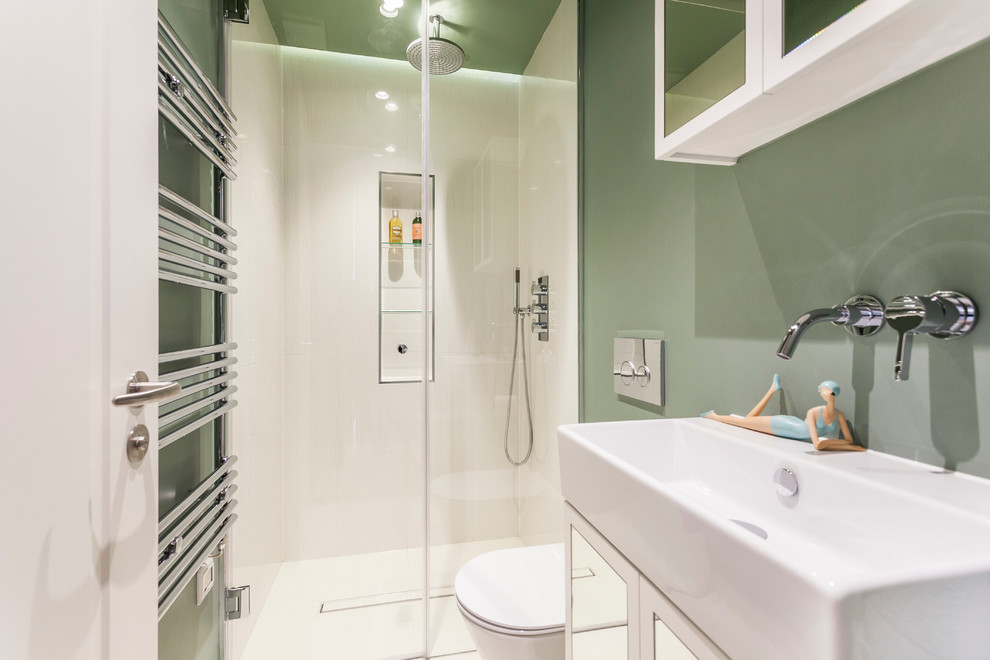 This is an example of a medium sized contemporary bathroom in London with white walls and ceramic flooring.