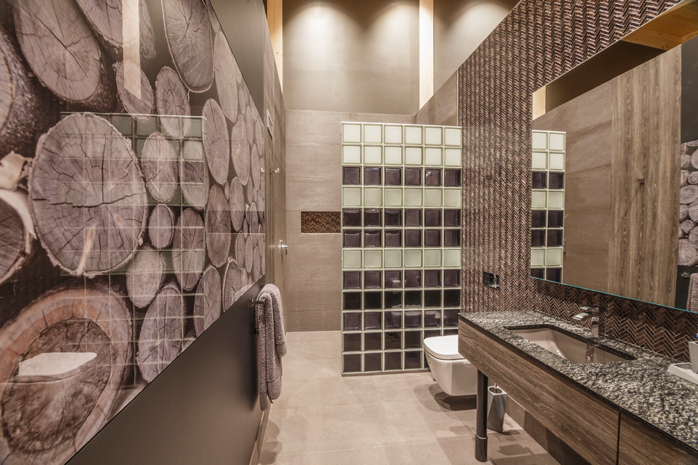 Example of a trendy master open shower design in Other with a wall-mount toilet and gray walls