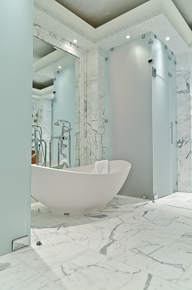 This is an example of a contemporary bathroom in Dallas with a freestanding bath.