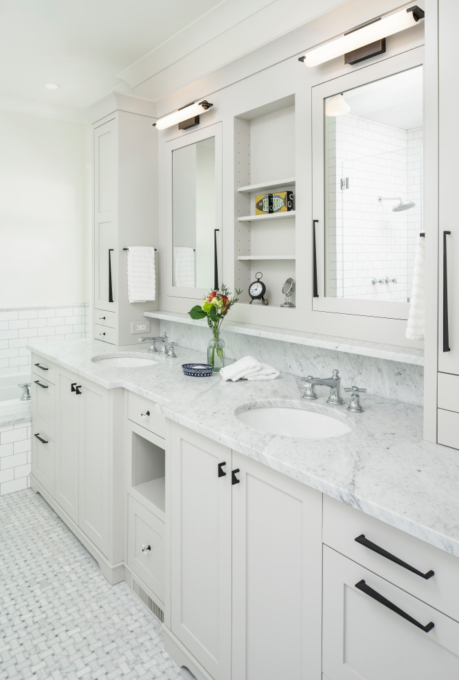 Photo of a medium sized traditional ensuite bathroom in Detroit with shaker cabinets, grey cabinets, a built-in bath, a corner shower, a one-piece toilet, white tiles, metro tiles, white walls, marble flooring, a submerged sink, engineered stone worktops, grey floors, a hinged door, grey worktops, a shower bench, double sinks and a built in vanity unit.