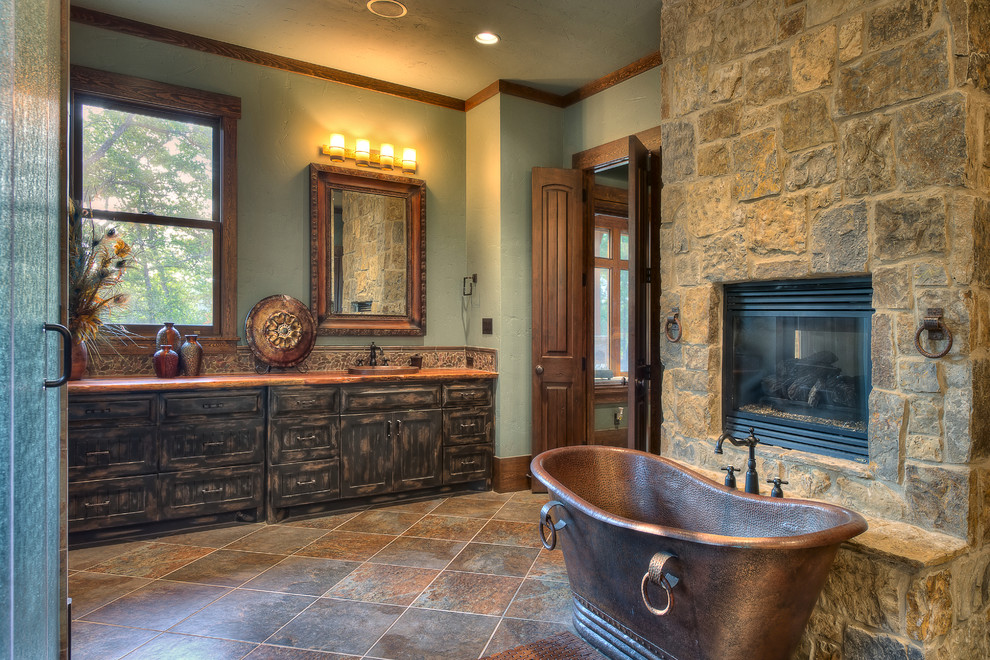 Inspiration for a rustic freestanding bathtub remodel in Houston