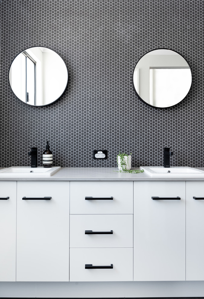 Example of an urban master black tile and mosaic tile ceramic tile and gray floor open shower design in Perth with white cabinets, a drop-in sink, quartz countertops and gray countertops