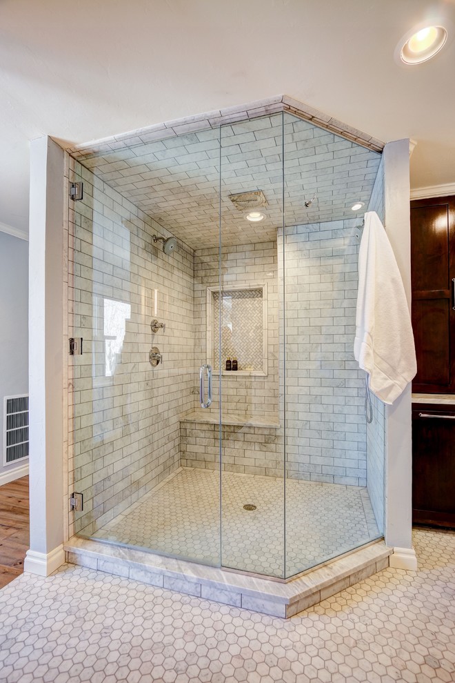 Inspiration for a large transitional master subway tile mosaic tile floor alcove shower remodel in Oklahoma City with shaker cabinets, dark wood cabinets, gray walls and an undermount sink
