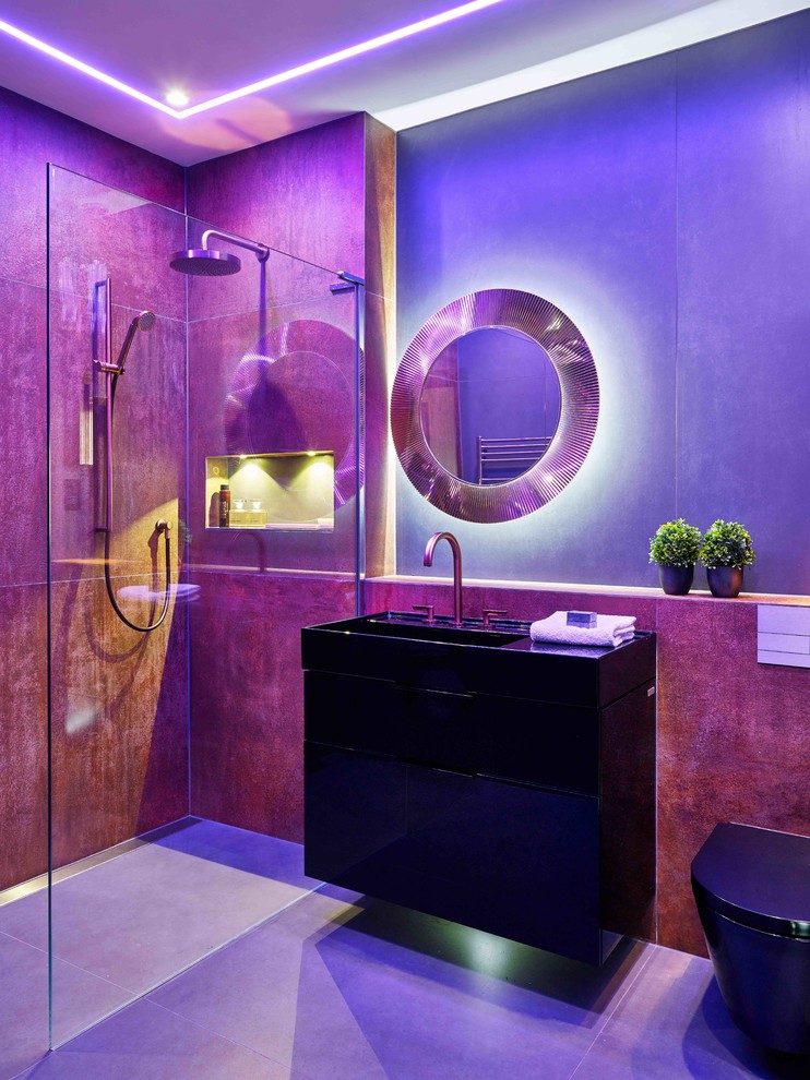 Immagine di una piccola stanza da bagno con doccia contemporanea con doccia aperta, WC sospeso e piastrelle in gres porcellanato