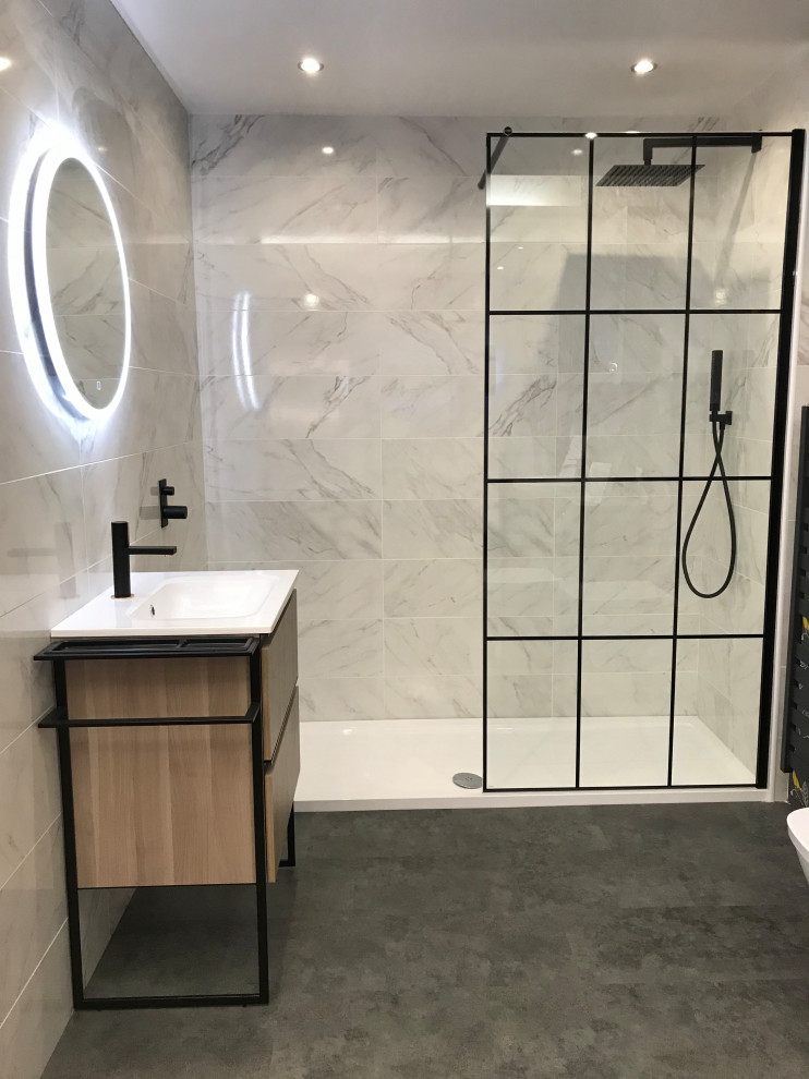 Industrial bathroom in Glasgow with flat-panel cabinets, a walk-in shower, grey tiles, ceramic tiles, grey walls, an open shower, white worktops, a single sink and a freestanding vanity unit.