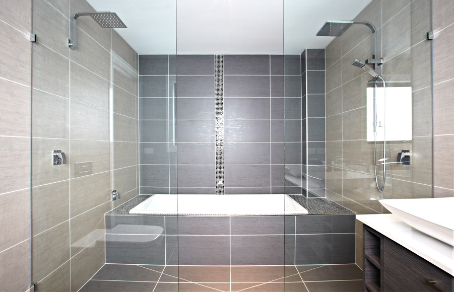 Design ideas for a medium sized contemporary ensuite bathroom in Melbourne with an alcove bath, a double shower, grey tiles, grey walls, a vessel sink, grey floors, an open shower and a wall mounted toilet.