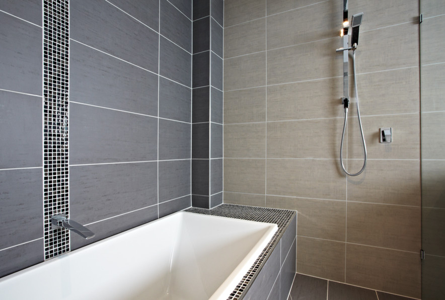 Photo of a medium sized contemporary ensuite bathroom in Melbourne with an alcove bath, a double shower, grey tiles, grey walls, grey floors and an open shower.