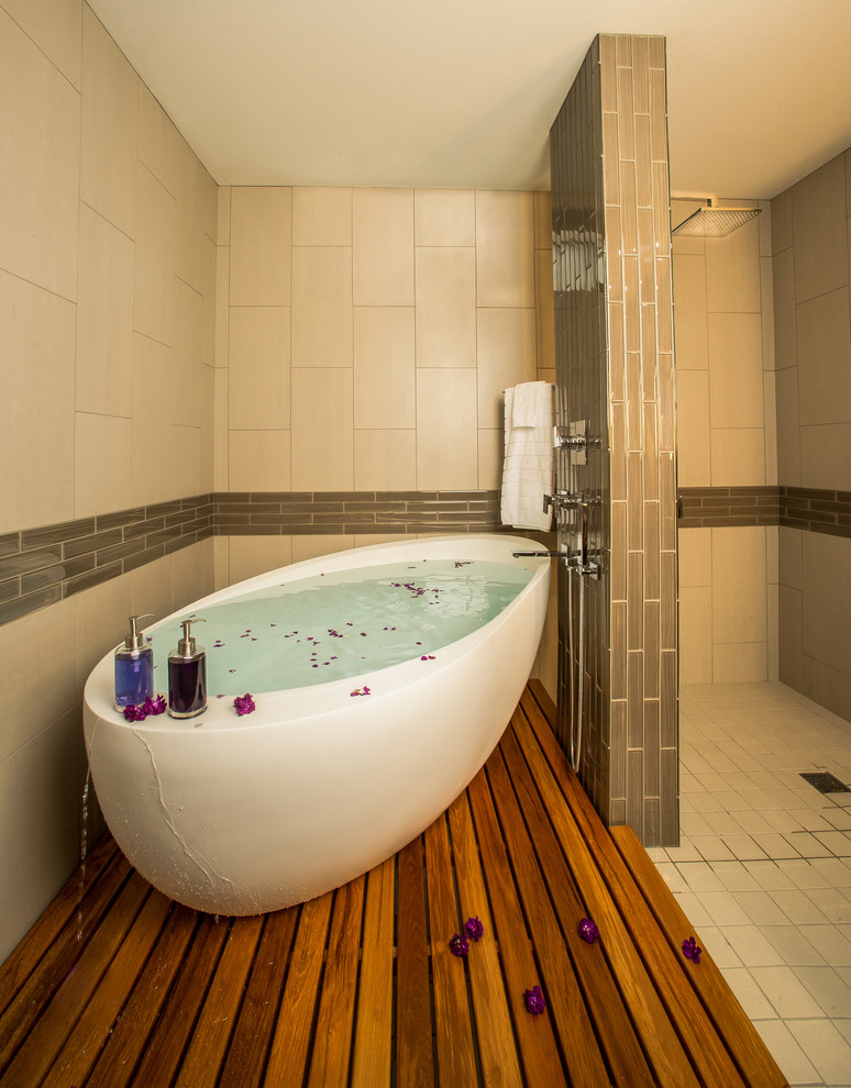 Example of a trendy subway tile freestanding bathtub design in Seattle