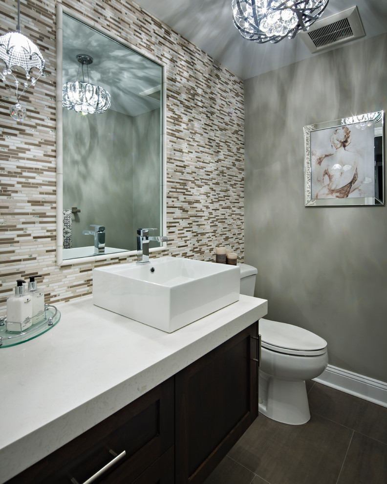 Bathroom - small contemporary 3/4 beige tile and mosaic tile porcelain tile bathroom idea in New York with a vessel sink, shaker cabinets, dark wood cabinets, quartz countertops, a two-piece toilet and beige walls