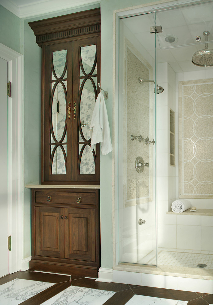 Bathroom - mid-sized traditional master white tile, beige tile and stone tile marble floor and white floor bathroom idea in New York with dark wood cabinets, beaded inset cabinets, green walls, an undermount sink, a two-piece toilet, limestone countertops and a hinged shower door