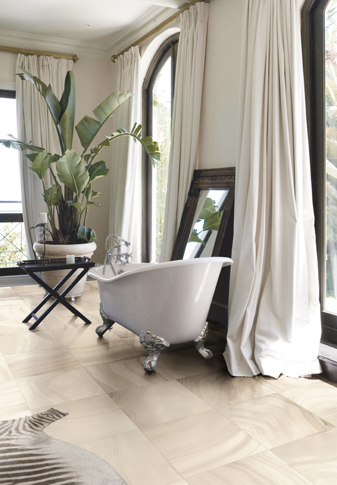 Inspiration for a large contemporary master porcelain tile and beige floor claw-foot bathtub remodel in Miami with white walls