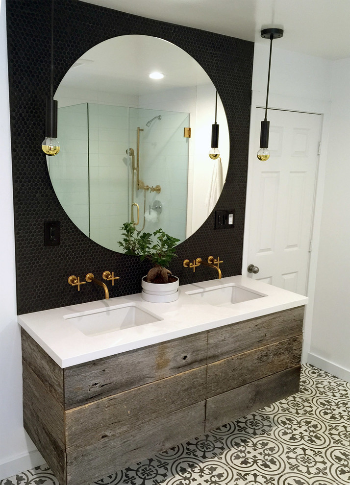 Inspiration for a modern black tile and mosaic tile bathroom remodel in Los Angeles with black walls