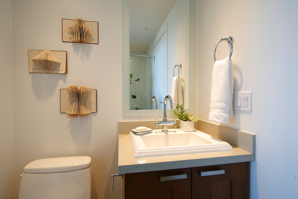 This is an example of a contemporary bathroom in Calgary with a built-in sink.