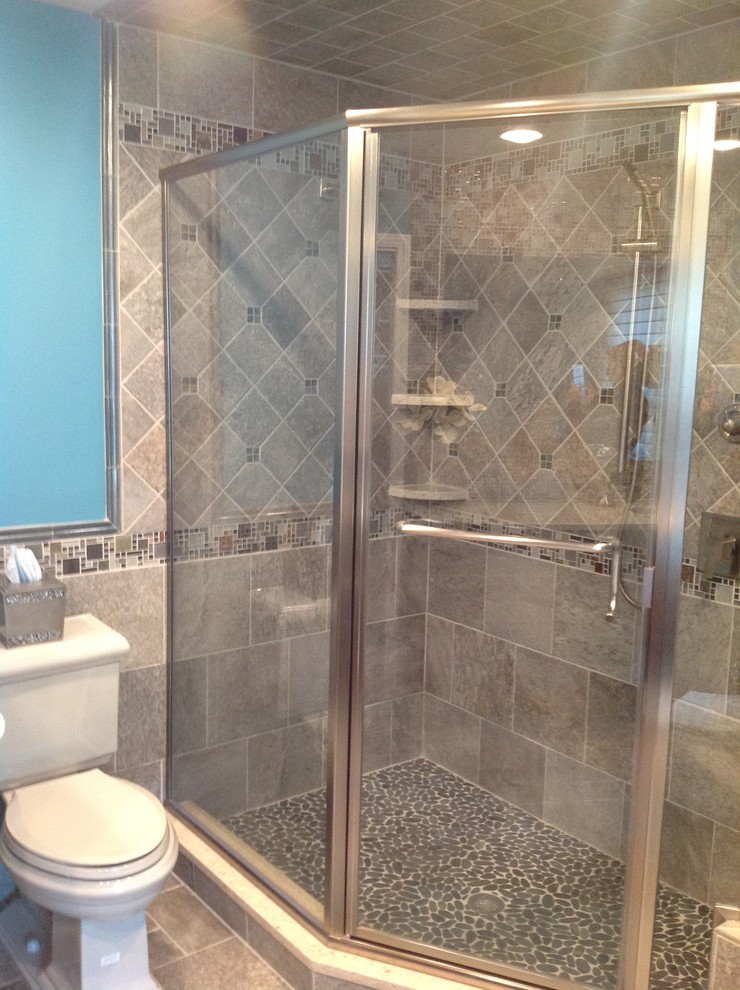 Large elegant master gray tile and porcelain tile porcelain tile bathroom photo in Newark with an undermount sink, shaker cabinets, dark wood cabinets, granite countertops, a one-piece toilet and gray walls