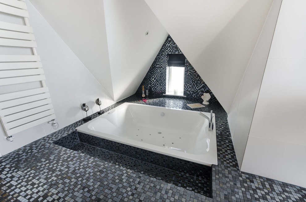 Freestanding bathtub - mid-sized modern mosaic tile floor freestanding bathtub idea in London with white walls