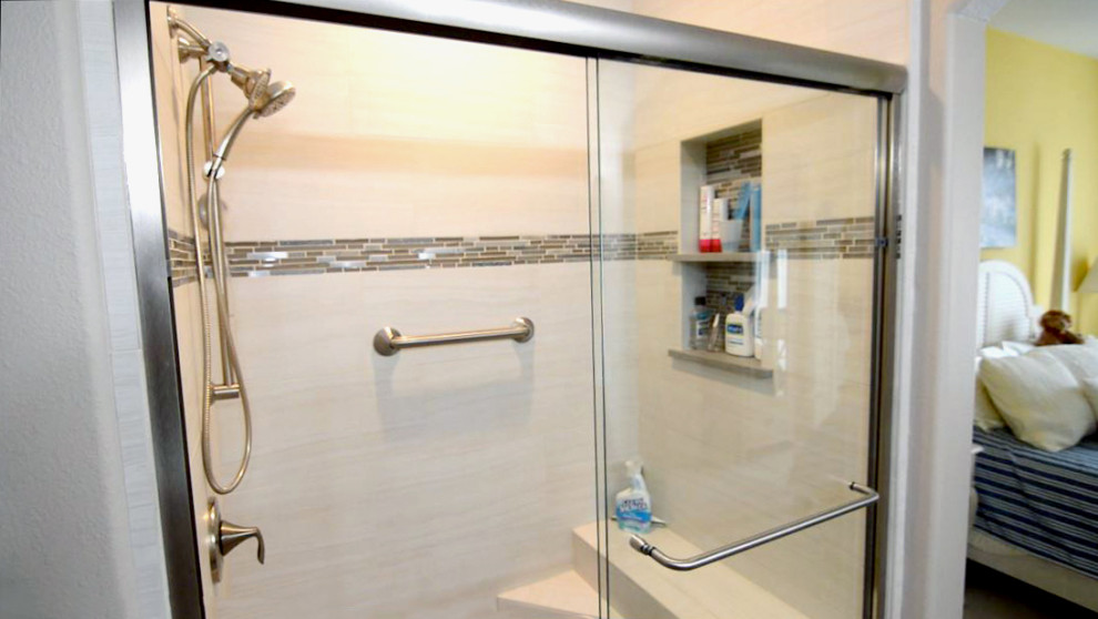 This is an example of a small modern family bathroom in Orange County with shaker cabinets, white cabinets, an alcove bath, a shower/bath combination, a two-piece toilet, beige tiles, porcelain tiles, beige walls, laminate floors, a submerged sink, engineered stone worktops, beige floors, a sliding door and grey worktops.