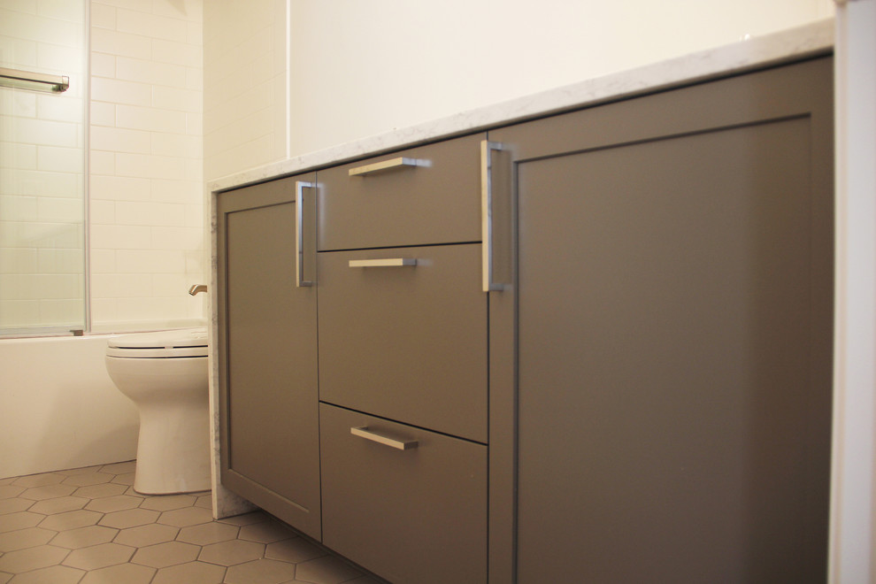 Example of a mid-sized minimalist 3/4 white tile and subway tile bathroom design in Portland with shaker cabinets, gray cabinets, white walls, an undermount sink and quartz countertops