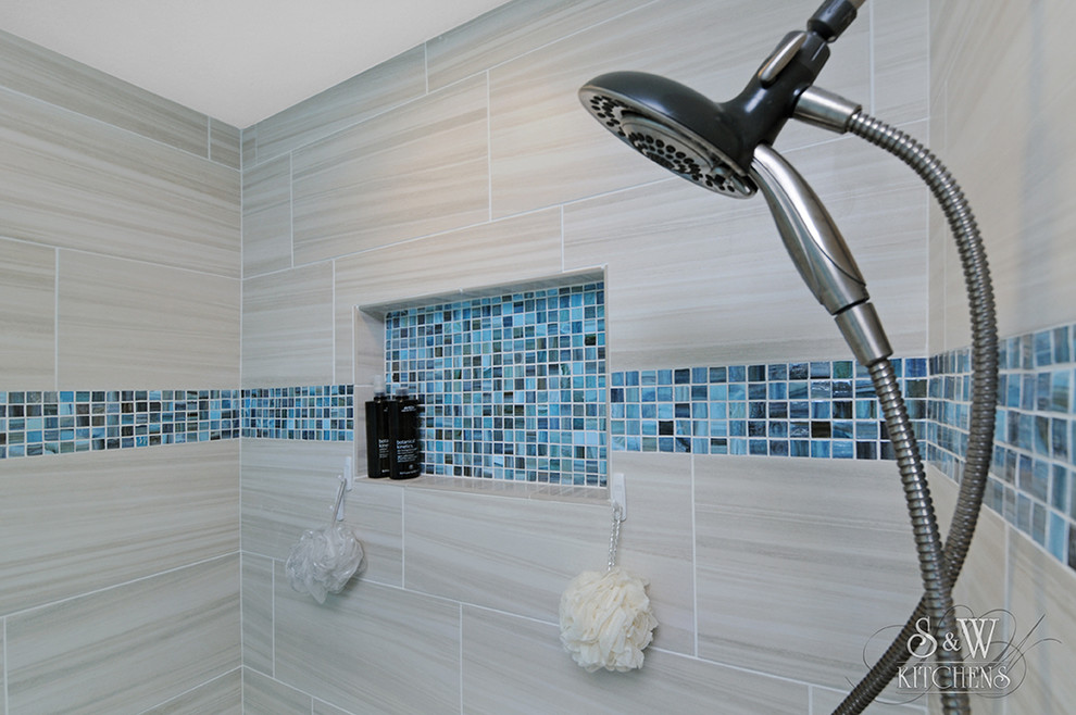 Bathroom - small coastal master blue tile and porcelain tile bathroom idea in Tampa with recessed-panel cabinets, gray cabinets, a two-piece toilet, blue walls, an undermount sink and quartz countertops