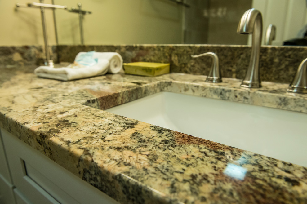 Classic bathroom in Atlanta with granite worktops and a submerged sink.