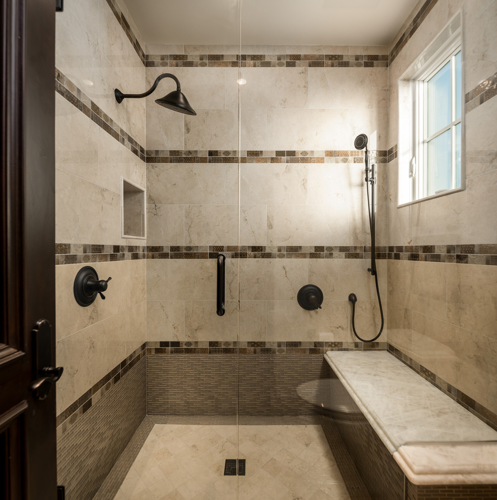 Example of a huge tuscan master gray tile and porcelain tile marble floor and multicolored floor bathroom design in Phoenix with furniture-like cabinets, brown cabinets, a one-piece toilet, multicolored walls, a vessel sink, granite countertops and a hinged shower door