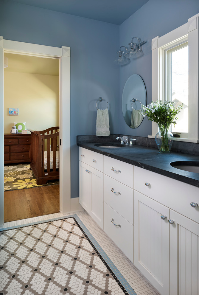 Example of an arts and crafts kids' multicolored tile bathroom design in Denver with white cabinets and blue walls