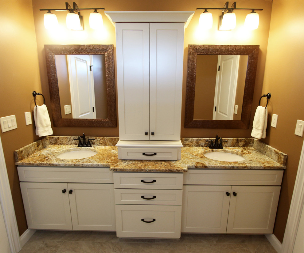 Example of a mid-sized classic kids' bathroom design in Cleveland with flat-panel cabinets and white cabinets