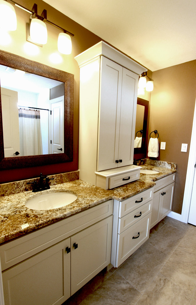 Bathroom - mid-sized traditional kids' bathroom idea in Cleveland with flat-panel cabinets and white cabinets