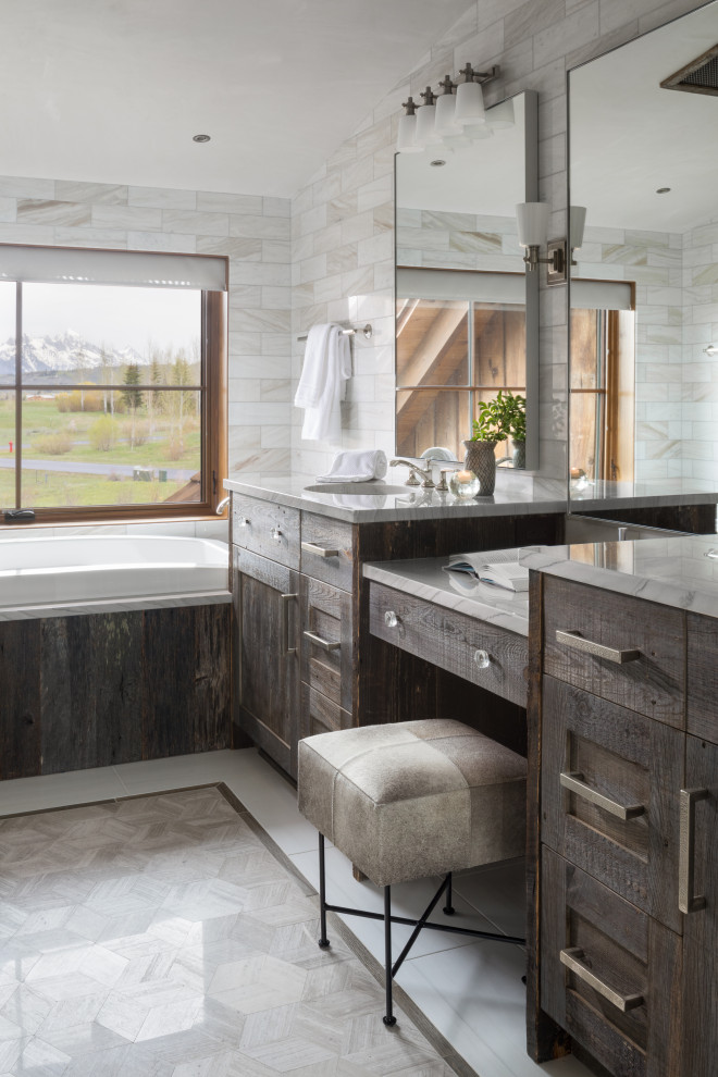 Design ideas for a rustic bathroom in Jackson with brown cabinets, a corner bath, marble worktops, double sinks and a built in vanity unit.