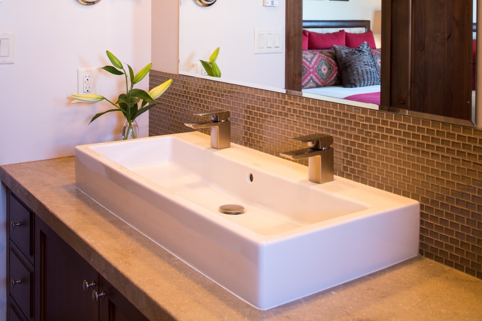 Example of a mid-sized transitional master brown tile and glass sheet bathroom design in Other with shaker cabinets, brown cabinets, white walls and a trough sink