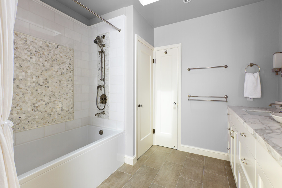 Mid-sized transitional master porcelain tile ceramic tile and beige floor bathroom photo in San Francisco with shaker cabinets, white cabinets, gray walls, an undermount sink and marble countertops