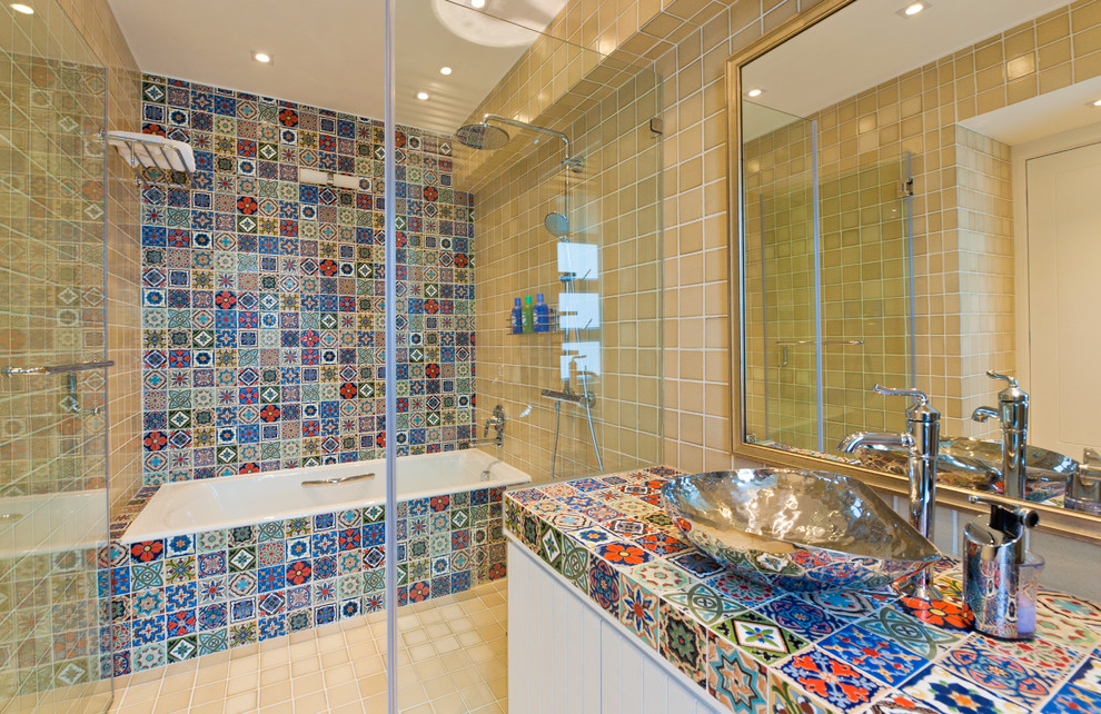 This is an example of a bohemian bathroom in Hong Kong with a vessel sink and multi-coloured worktops.