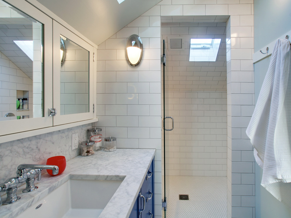 Inspiration for a timeless bathroom remodel in Seattle with an undermount sink and blue cabinets