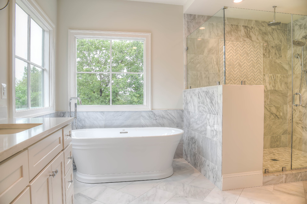 Example of a large arts and crafts master bathroom design in DC Metro with shaker cabinets, white cabinets, an undermount sink, quartz countertops, a hinged shower door and white countertops