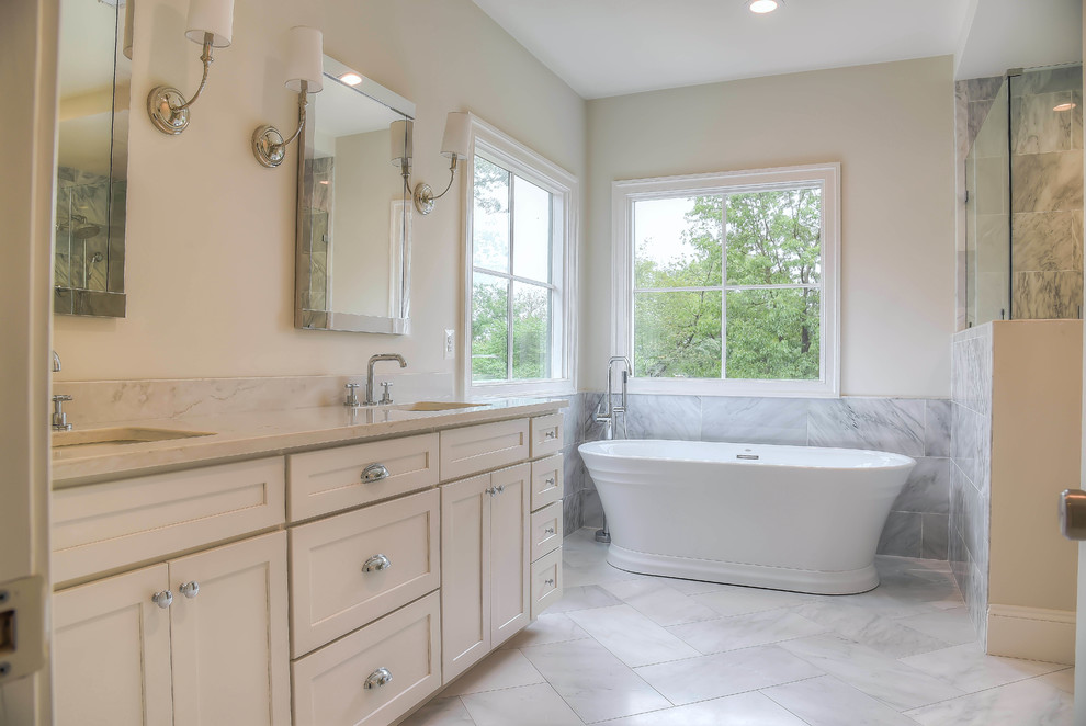 Large arts and crafts master bathroom photo in DC Metro with shaker cabinets, white cabinets, an undermount sink, quartz countertops, a hinged shower door and white countertops