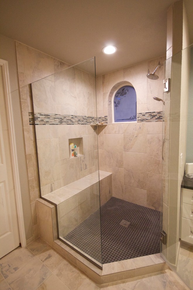 Mid-sized transitional master multicolored tile and ceramic tile ceramic tile corner shower photo in Seattle with an undermount sink, white cabinets, quartz countertops, a two-piece toilet, blue walls and shaker cabinets