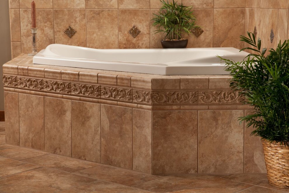 Inspiration for a traditional bathroom in Milwaukee with a built-in bath, beige tiles, ceramic tiles, beige walls, ceramic flooring and beige floors.